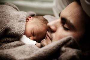 Sleeping baby with dad