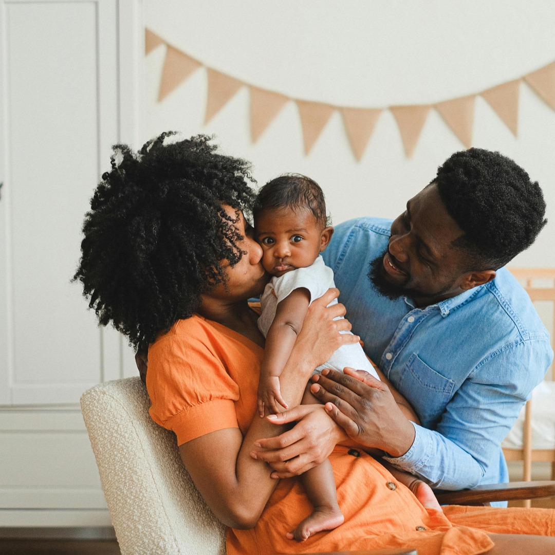 African American family loving their baby