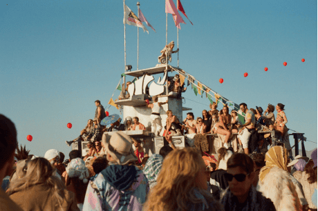 Group of individuals celebrating at burning man